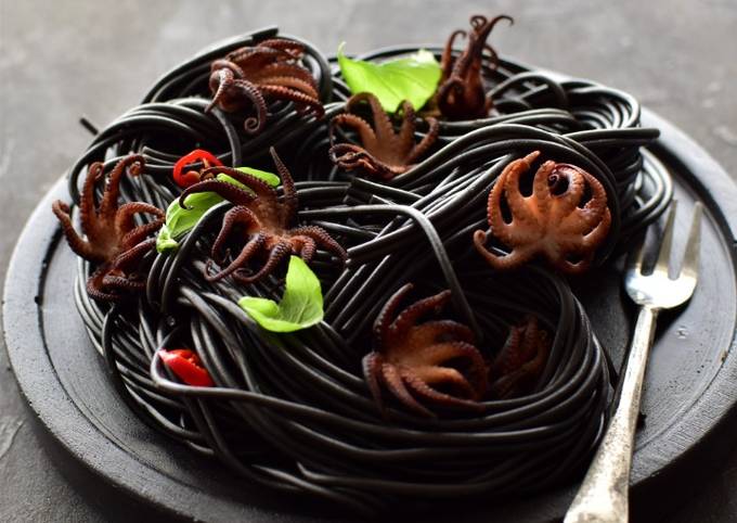 marinated baby octopus and squid ink pasta recipe main photo