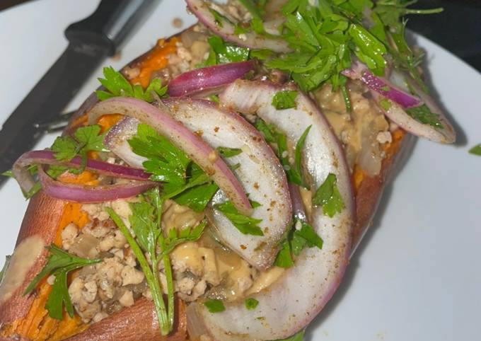 recipe of favorite sweet potato stuffed with spiced beef tahini and parsley salad