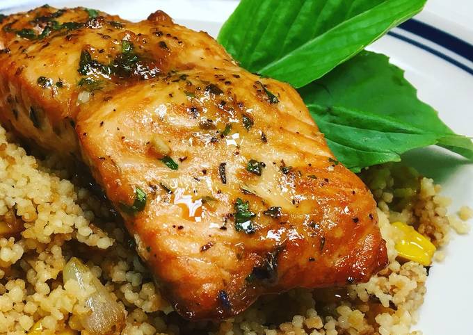 recipe of perfect sesame lemon soy baked salmon with a toasted couscous caramelized onionsmushroom and sweet corn