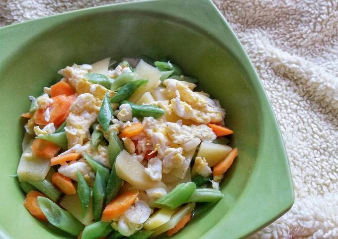 stir fried carrots green beans potatoes and egg recipe main photo