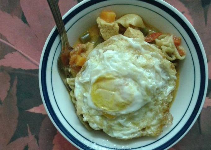 tofu and mushroom soupy mixed pasta served with fried eggs recipe main photo