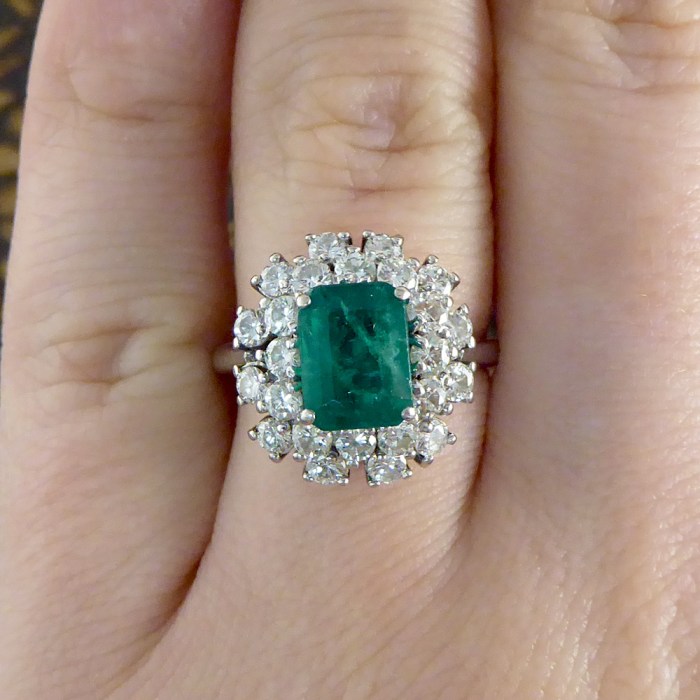 Emerald and diamond cluster ring