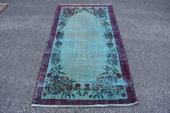 Antique overdyed rug