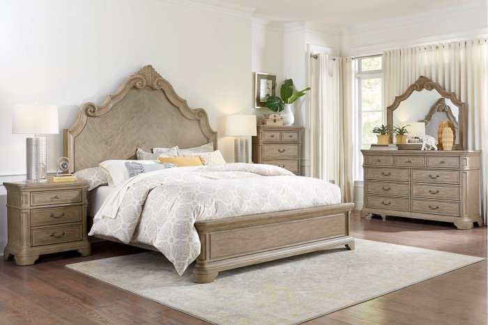 grand french country bedroom set in a rustic hue.jpeg